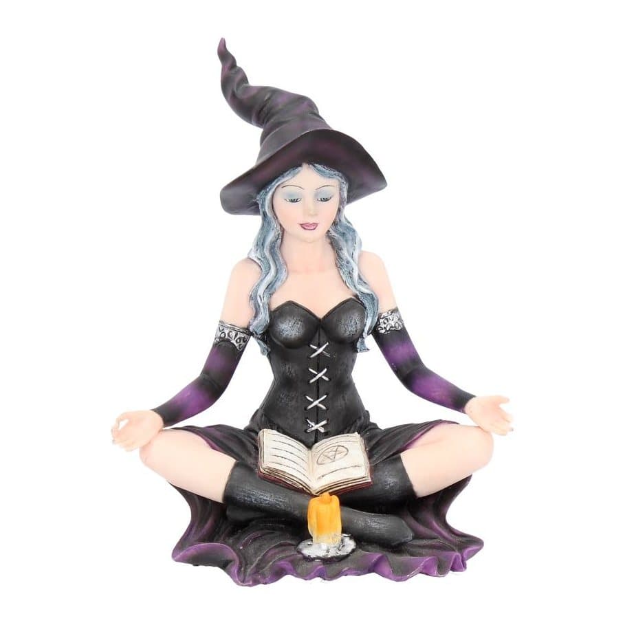 Aradia witch figurine seated cross-legged in a black corseted dress holding a grimoire