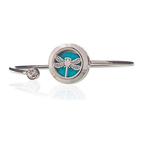 Stainless steel aromatherapy bracelet with a dragonfly locket and ventilation holes