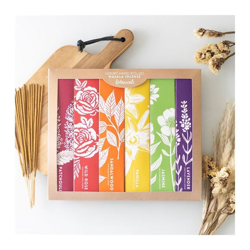 Colour cardboard box with window holding six packs of masala incense sticks