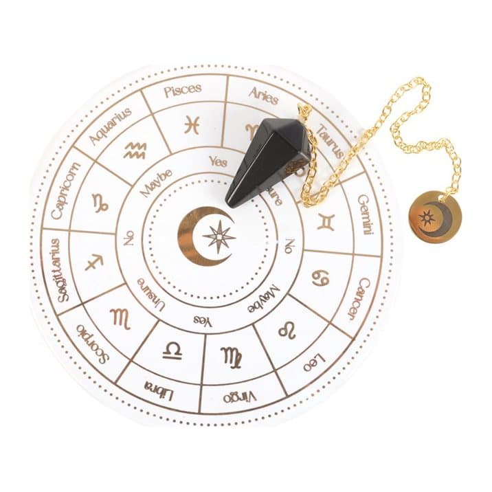 Ceramic dish with gold-effect astrology wheel and crystal pendant