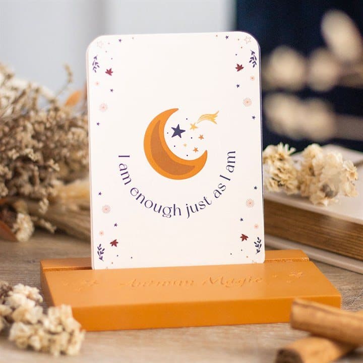 Autumn Magic affirmation cards beside a matching wooden stand