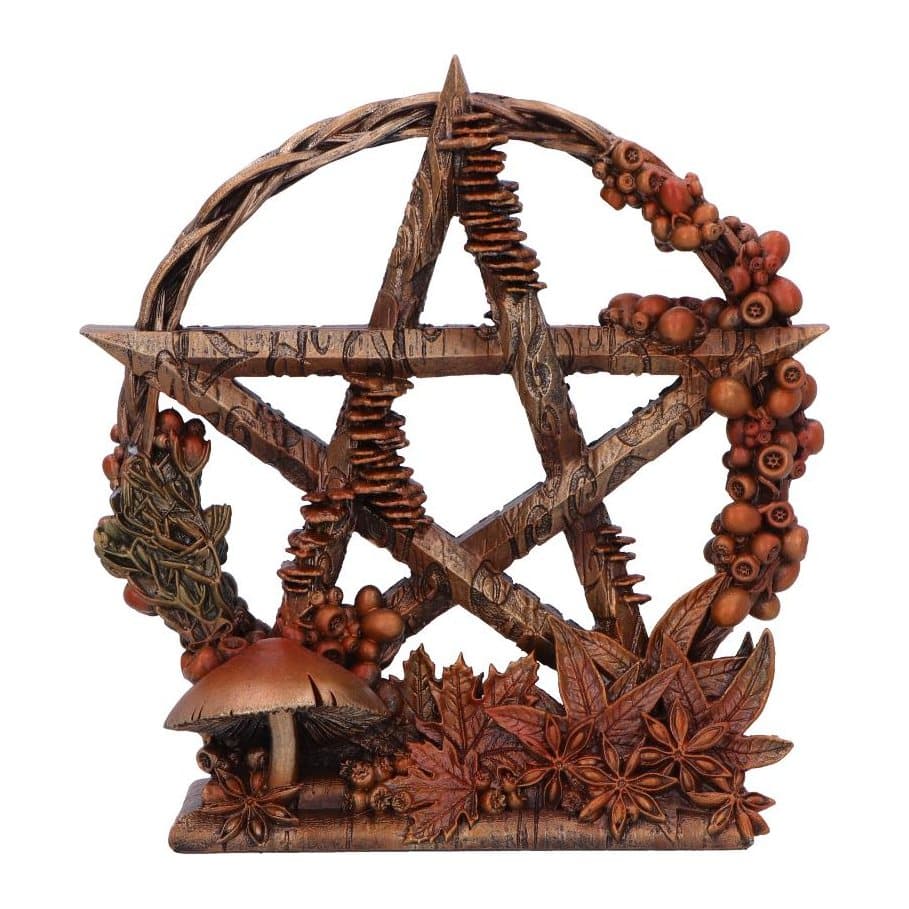 Pentagram ornament decorated with warm autumn leaves on a wood-look base