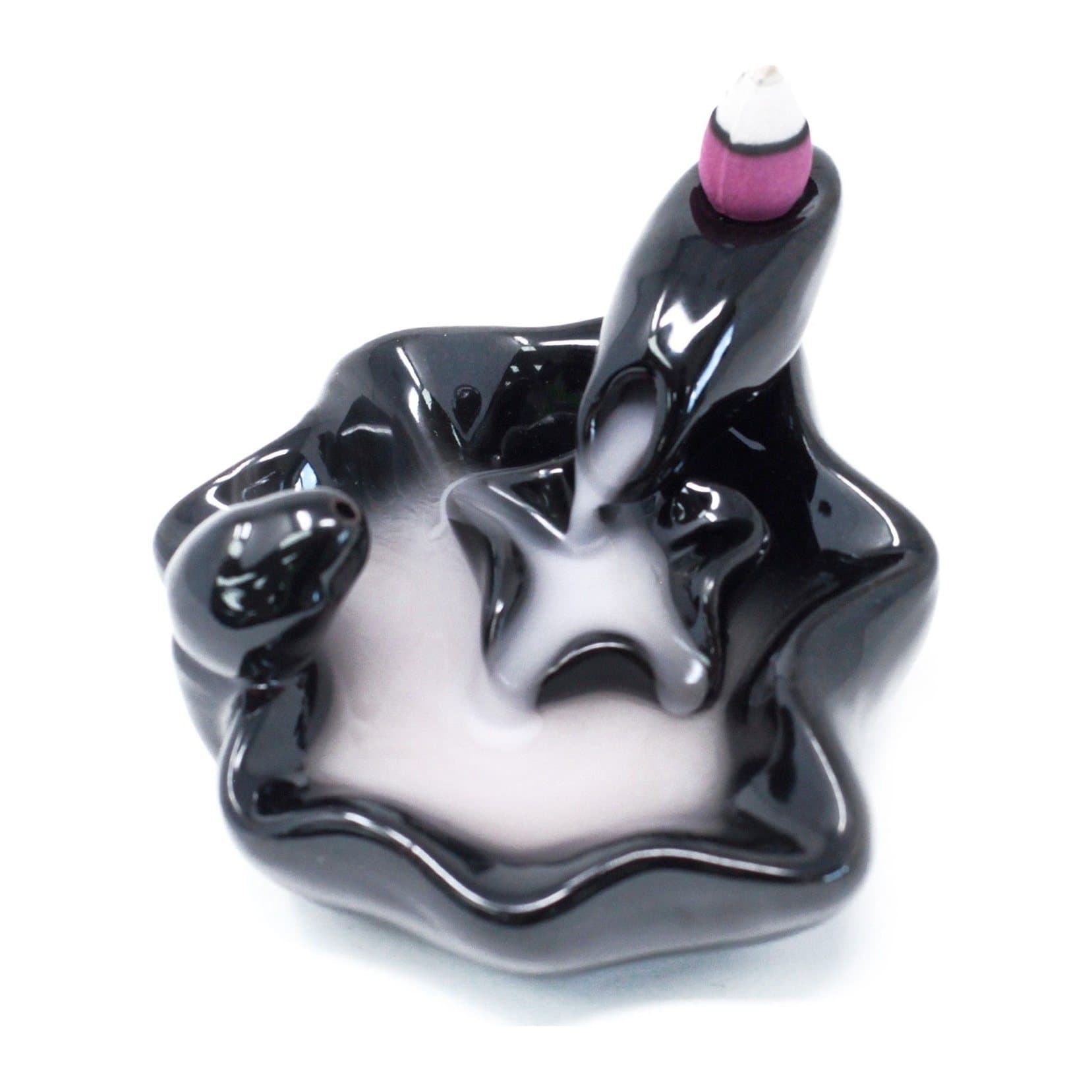 Ceramic backflow incense burner with smoke pooling at the bottom