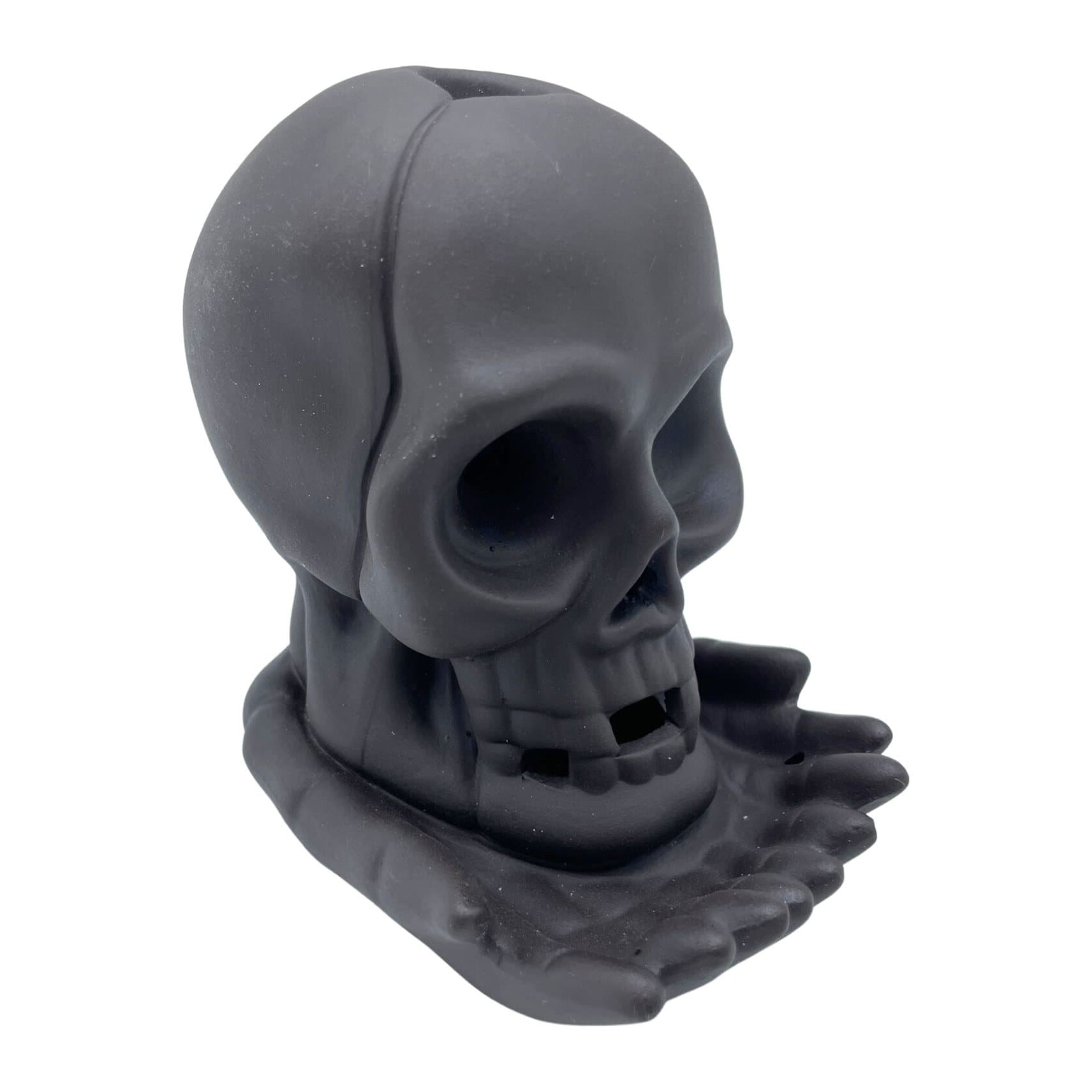 Ceramic weeping skull backflow incense burner with light