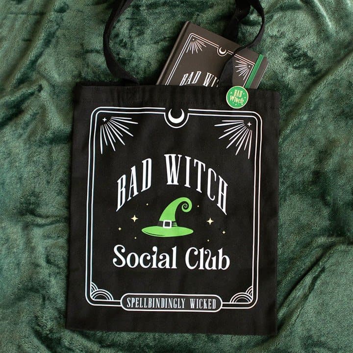 Black polycotton tote bag with Bad Witch Social Club text and pin badge