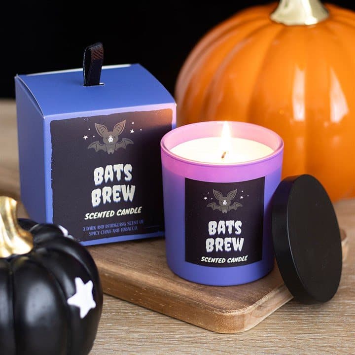 Bat's Brew clove and tobacco scented candle with its colour cardboard box