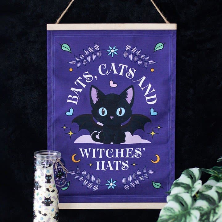 Fabric wall hanging with the words Bats, Cats and Witches Hats and a black cat