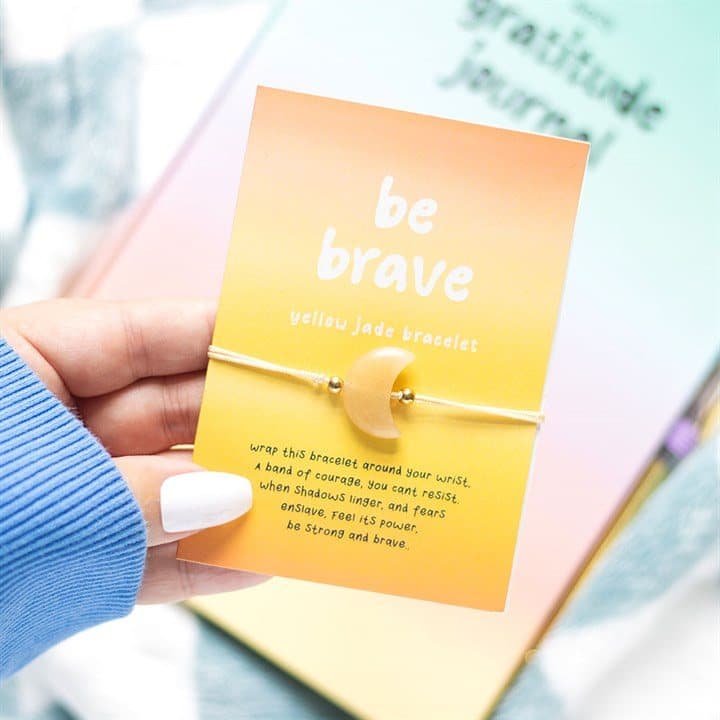 Yellow jade crystal moon bracelet on a Be brave backing card