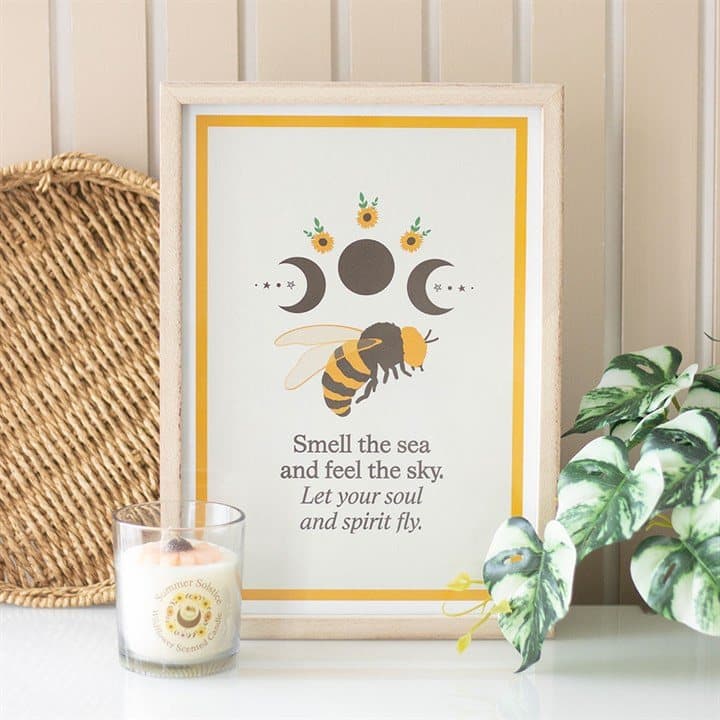 Framed print of a bee, sunflowers and moon phases with a quote