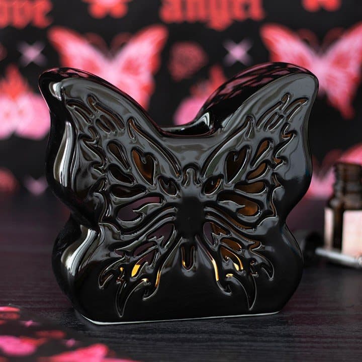 Black ceramic butterfly oil burner with cut-out detailing