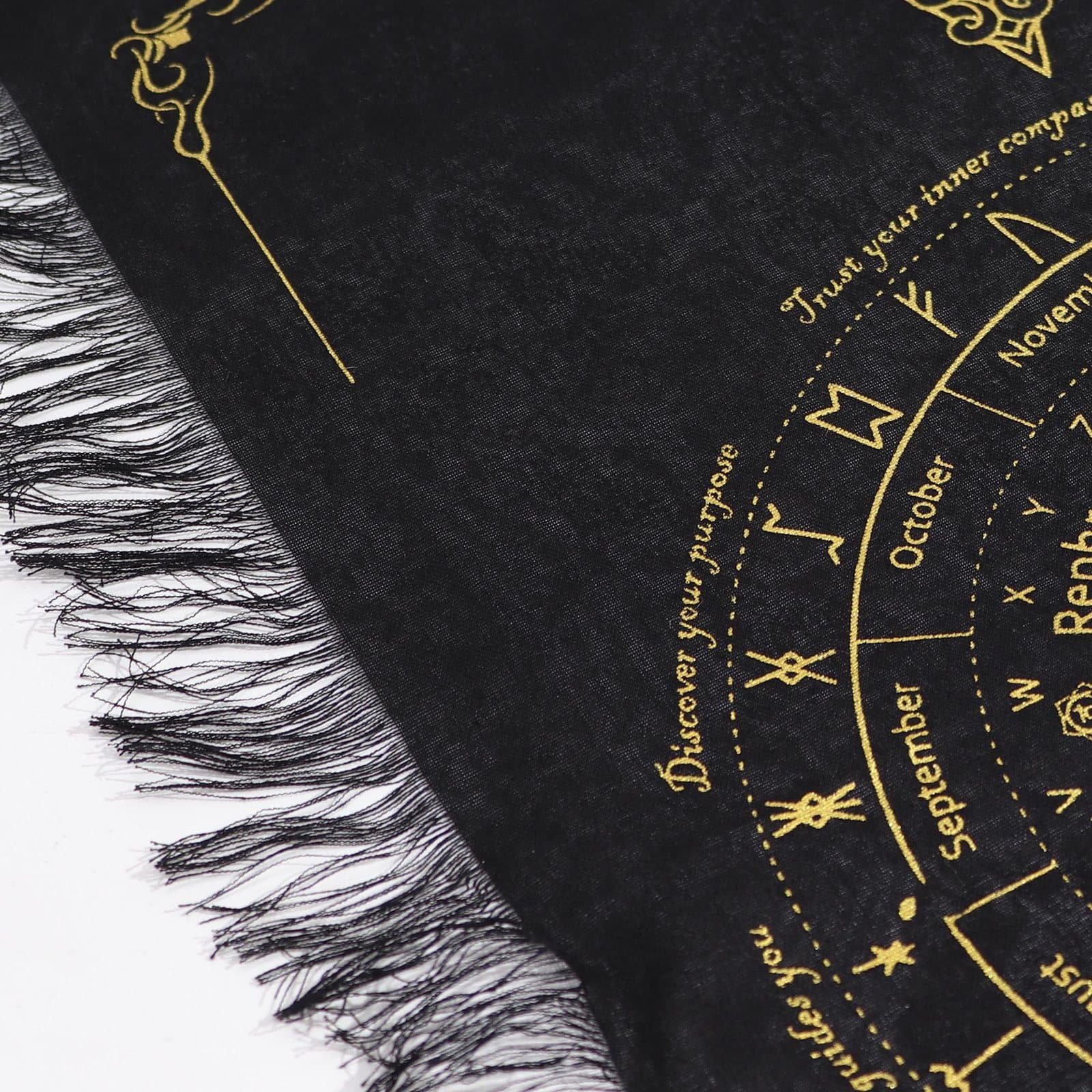 Cotton pendulum divination cloth with a sun face at the centre and fringe edges