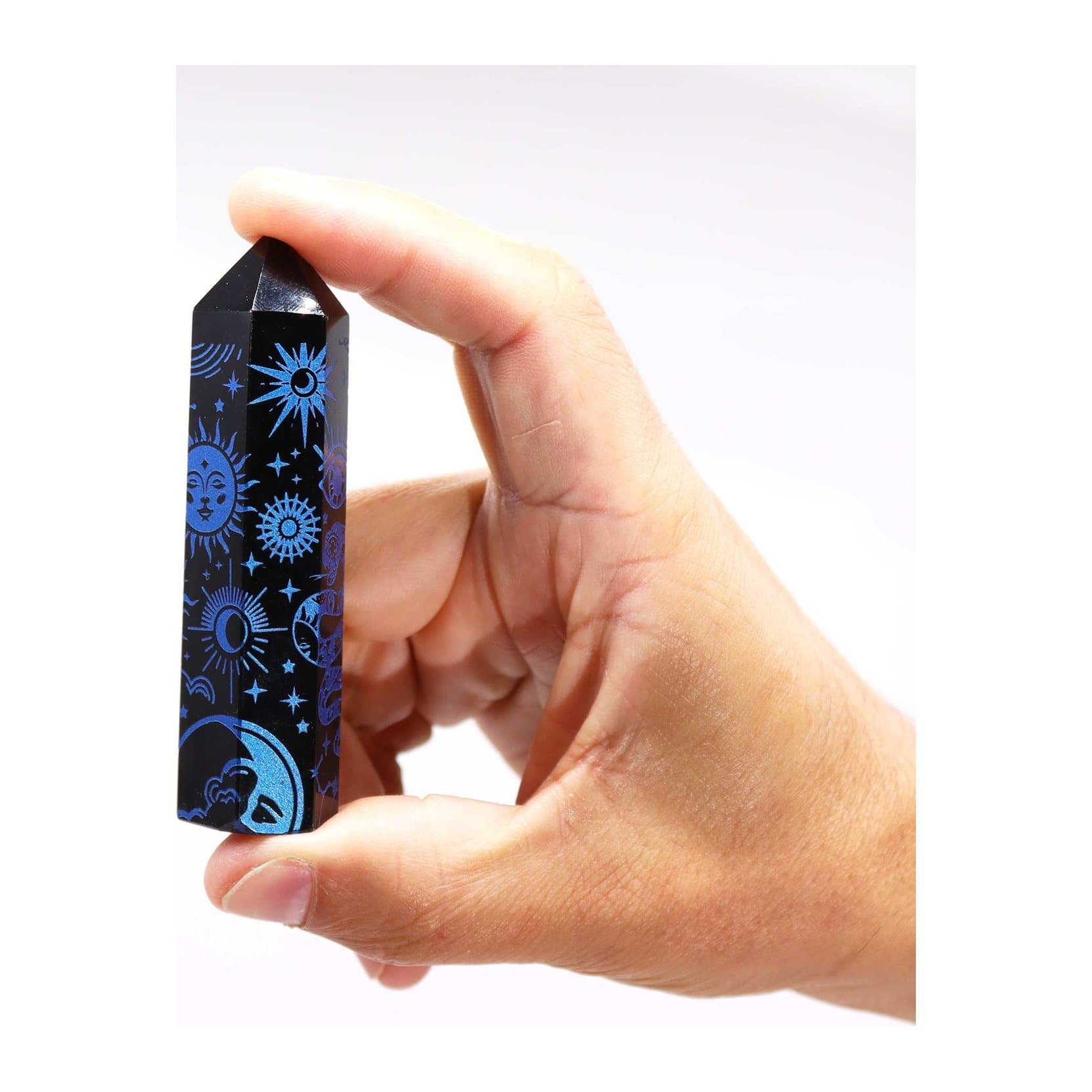 Black obsidian crystal point decorated with midnight blue celestial patterns