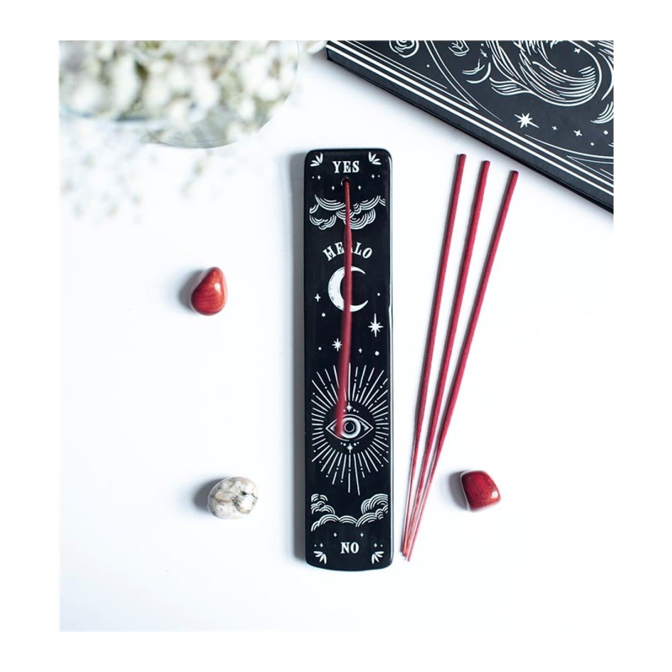 Black ceramic incense ash catcher with stars, moons and an all-seeing eye