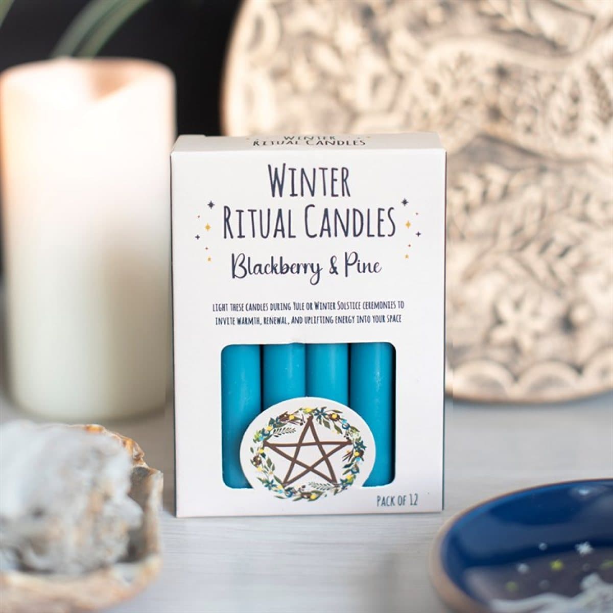 Box of 12 blackberry and pine spell candles in a windowed colour box