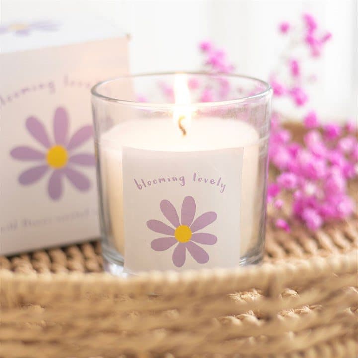 Wildflower scented candle with purple and yellow daisy design and Blooming Lovely text