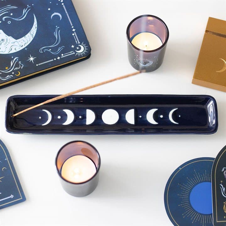Blue ceramic incense ash catcher with moon phase design
