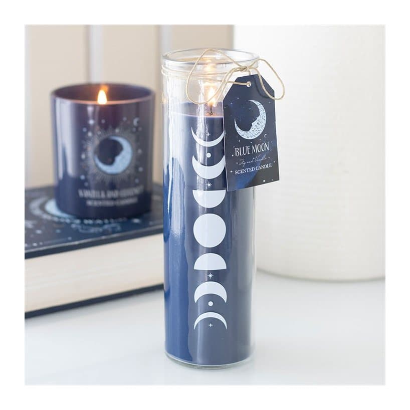 Glass tube candle with a blue moon phase design