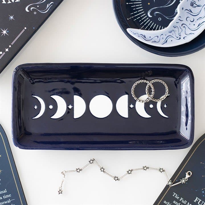Blue ceramic trinket dish with a moon phase design