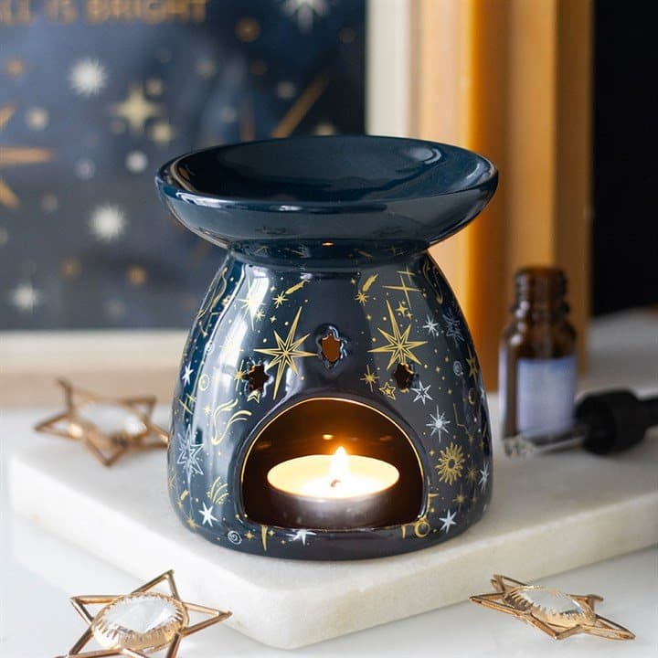 Blue ceramic oil burner with a starry night pattern