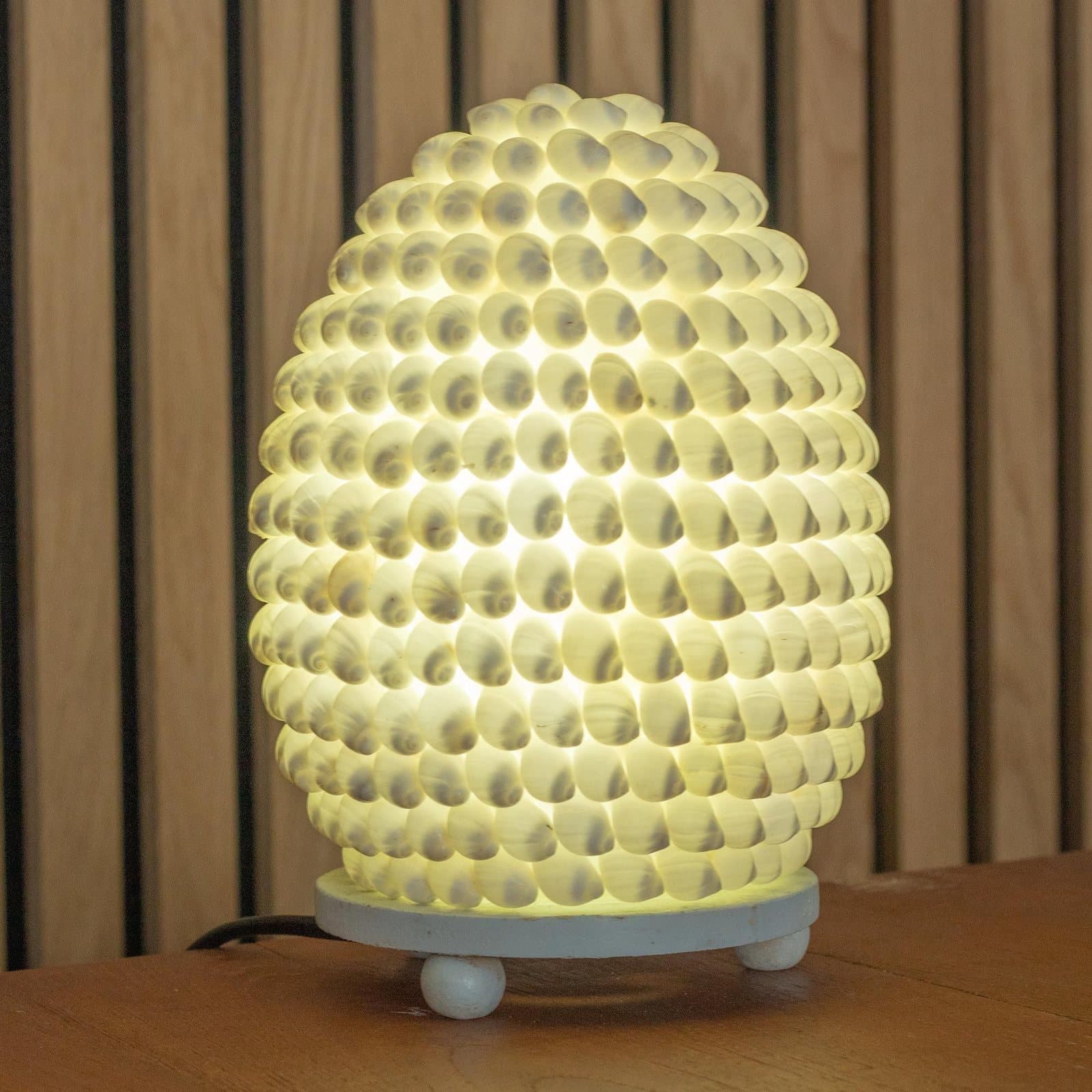 Oval boho sea shell lamp made from natural buting shells