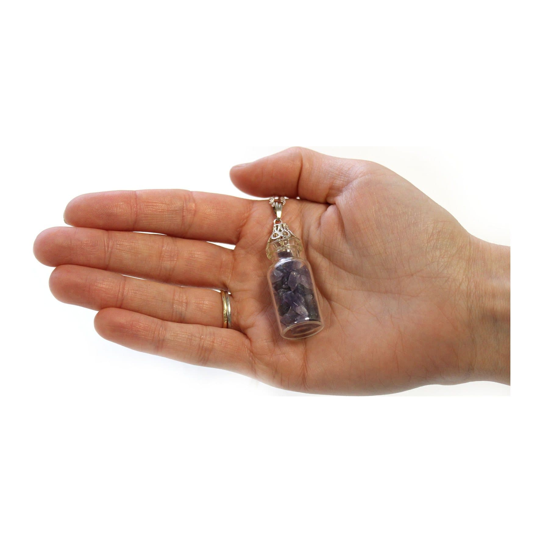 Small bottle necklace filled with tiny amethyst stones and a decorated screw cap