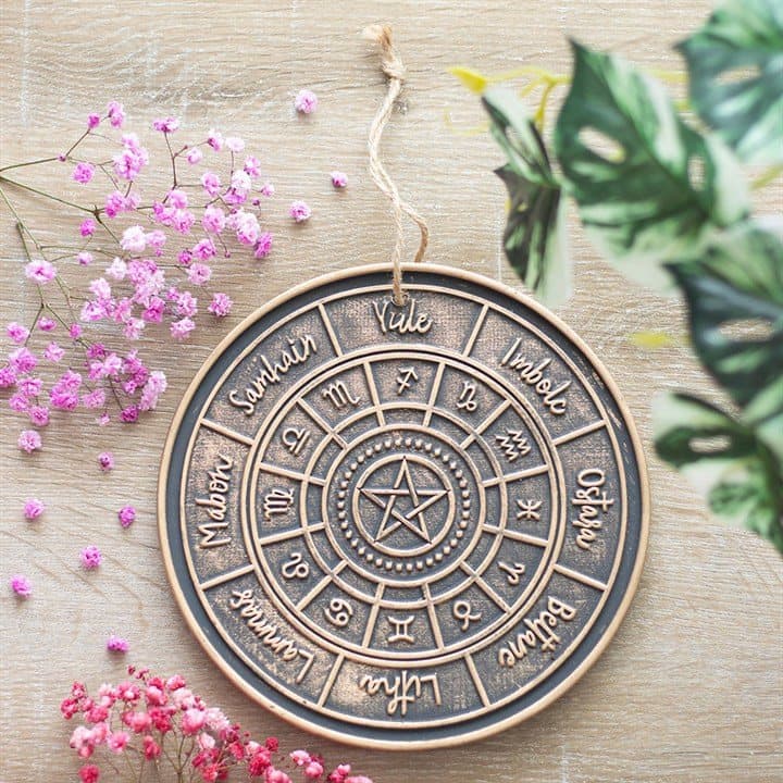 Bronze-effect terracotta plaque engraved with the Wheel of the Year
