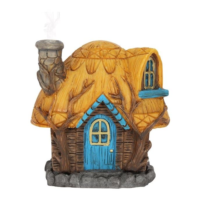 Little house shaped incense cone burner with a fairy chimney