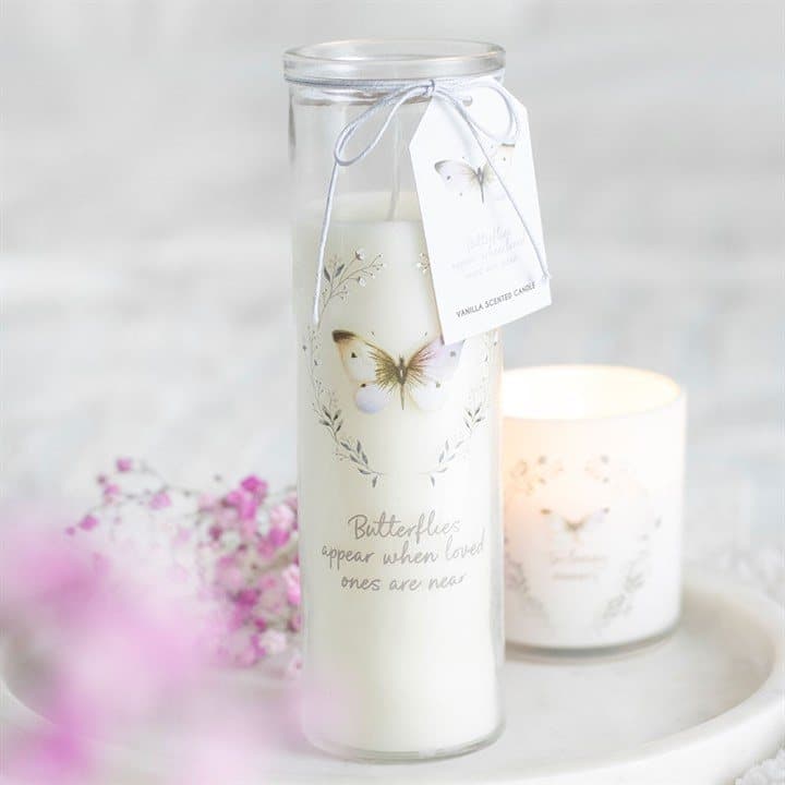 Vanilla tube candle with a butterfly motif and a memorial message