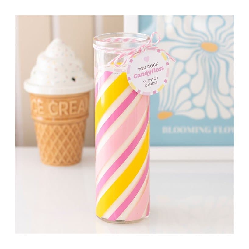 Pink candy stripe glass tube candle styled like a stick of rock