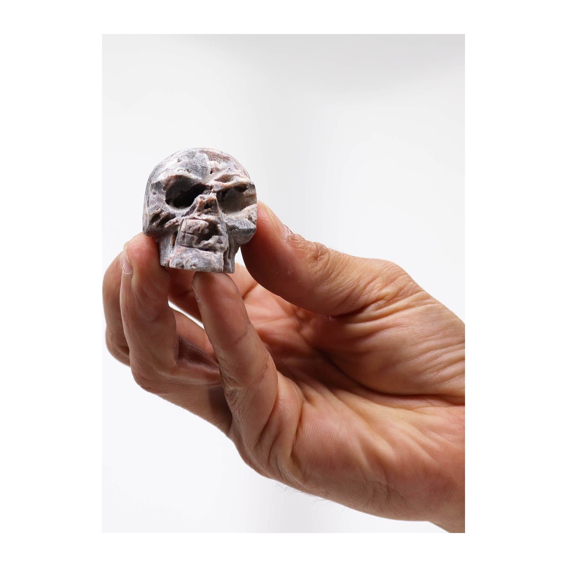 Carved calcite geode skull showing natural colours and geode texture
