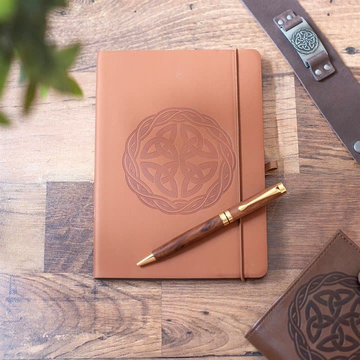 Brown A5 faux leather notebook embossed with a Celtic shield knot, with pen