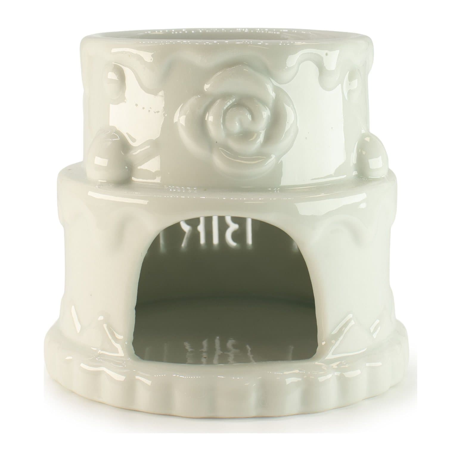 White ceramic cake oil burner with rose accents and Happy Birthday cut-out lettering
