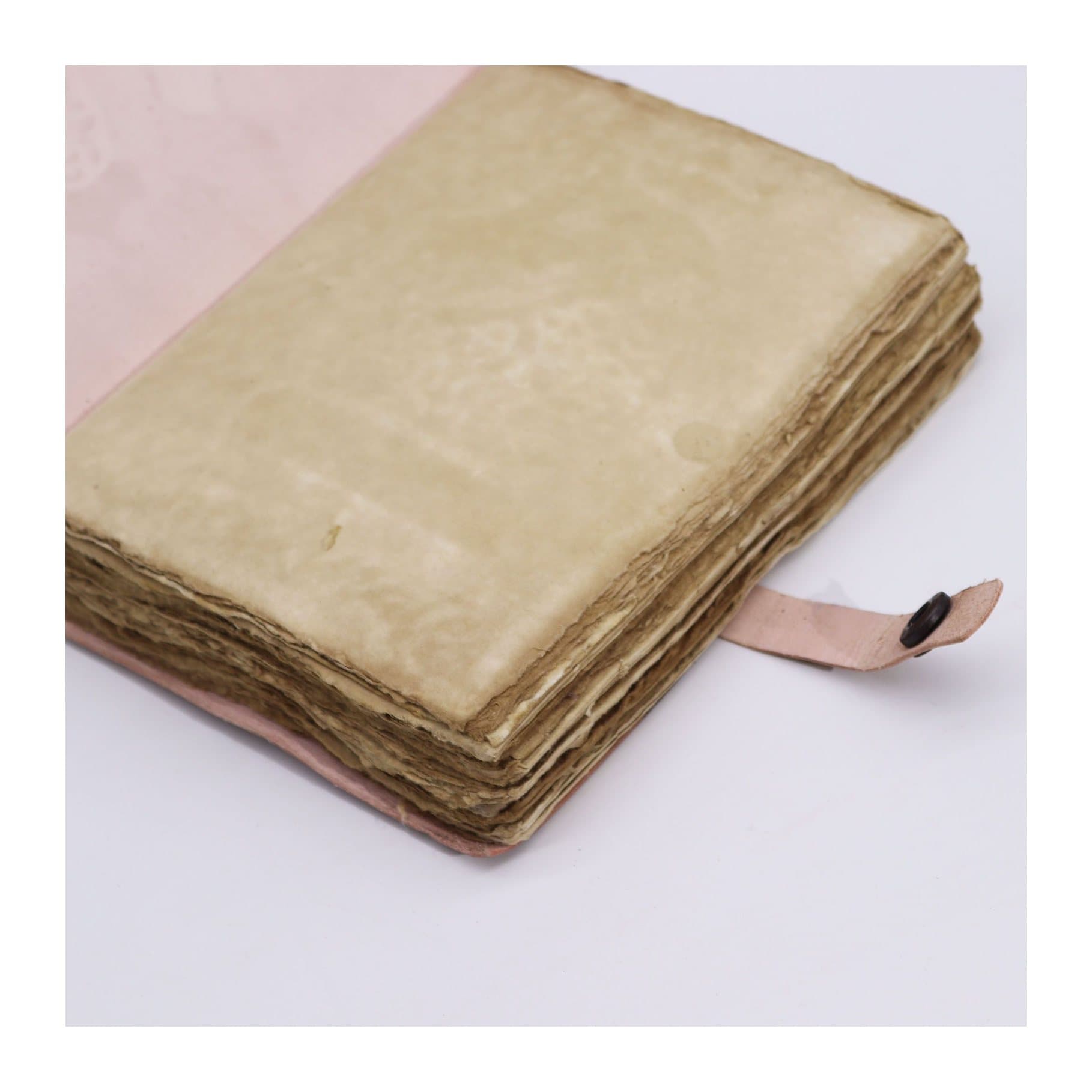 Light tan leather Checkmate notebook with deckle-edged pages
