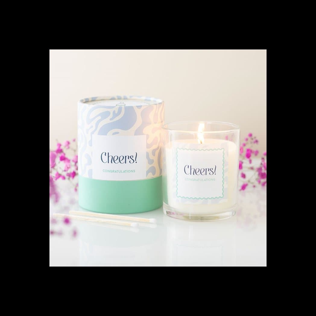 Champagne Fizz celebration candle with its colour cardboard box
