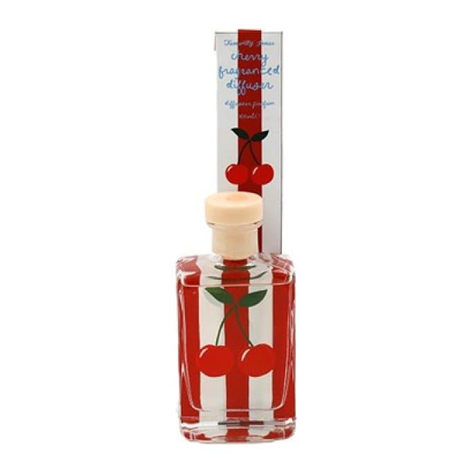 Cherry reed diffuser bottle with a cherry design and its box