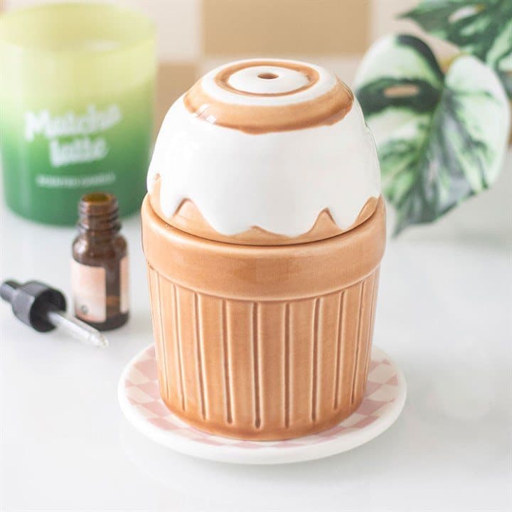 Ceramic cinnamon roll shaped oil burner