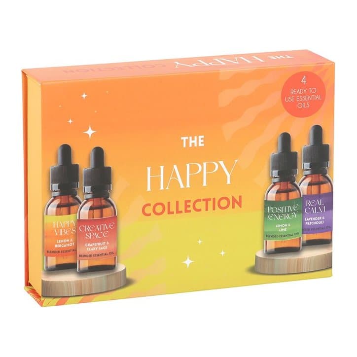 Four 10 ml glass essential oil bottles with dropper lids in a cardboard display box