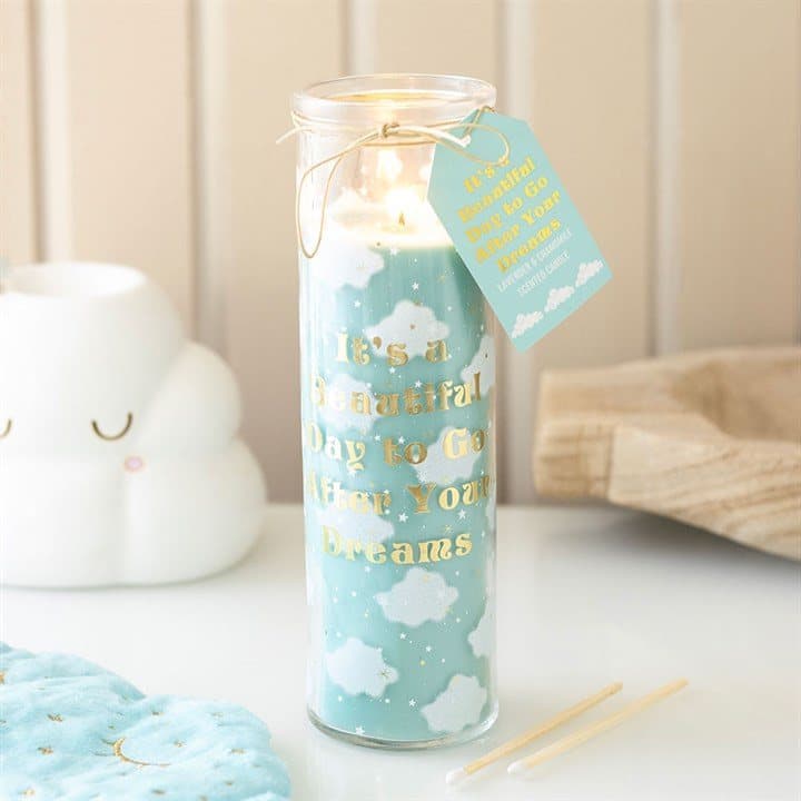 Tall glass tube candle with a cloud print and gold foil text