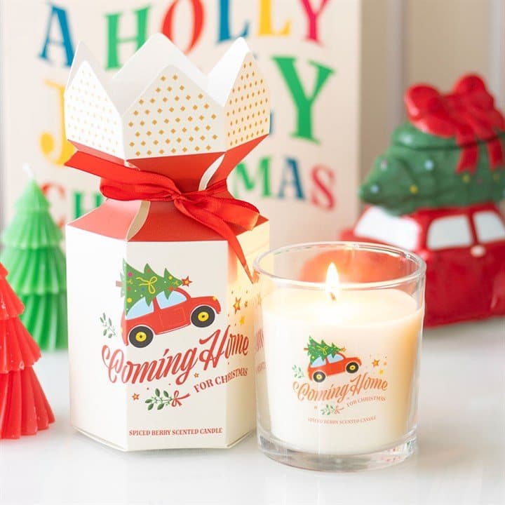 Spiced berry Christmas candle in a glass holder with a red car design