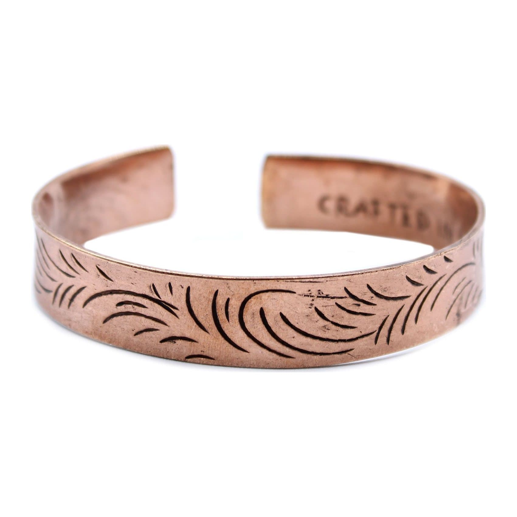 Wide solid copper bracelet with tribal swirls