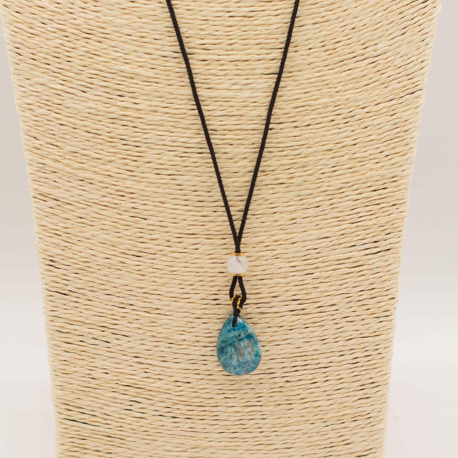 Howlite teardrop pendant on a black adjustable cord necklace