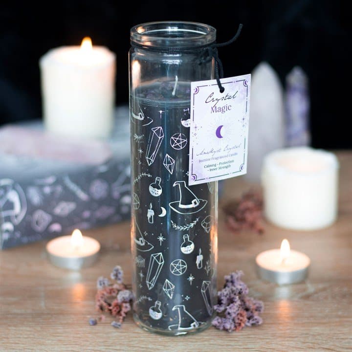Jasmine tube candle with amethyst chips and a crystal witch design in a window box