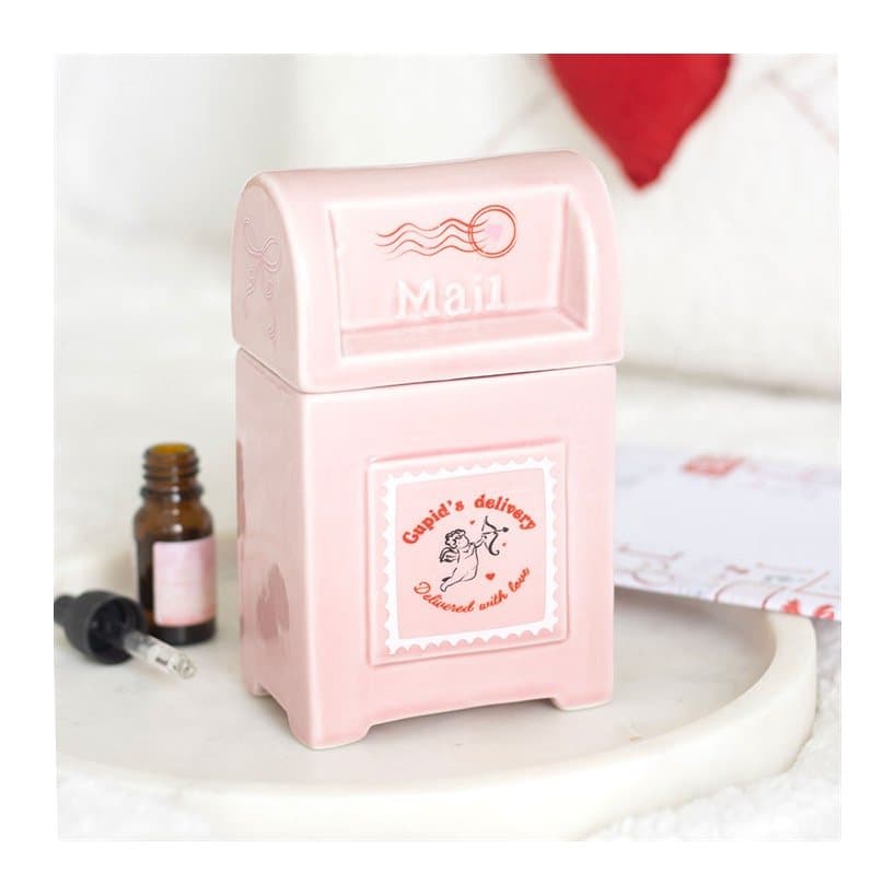 Ceramic postbox shaped oil burner with a lid