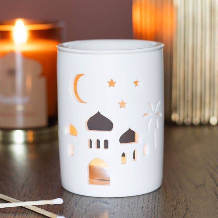 Cylindrical ceramic burner with a cut-out mosque design