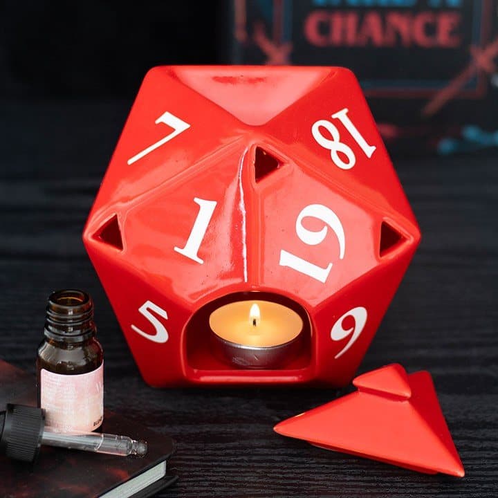 Ceramic oil burner shaped like a D20 gaming dice with a lid