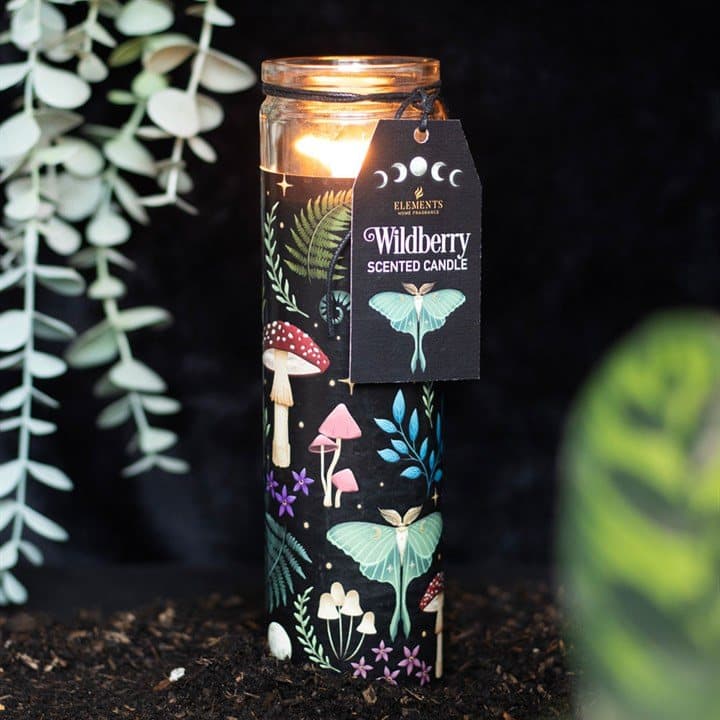 Glass tube candle decorated with a mystical forest print