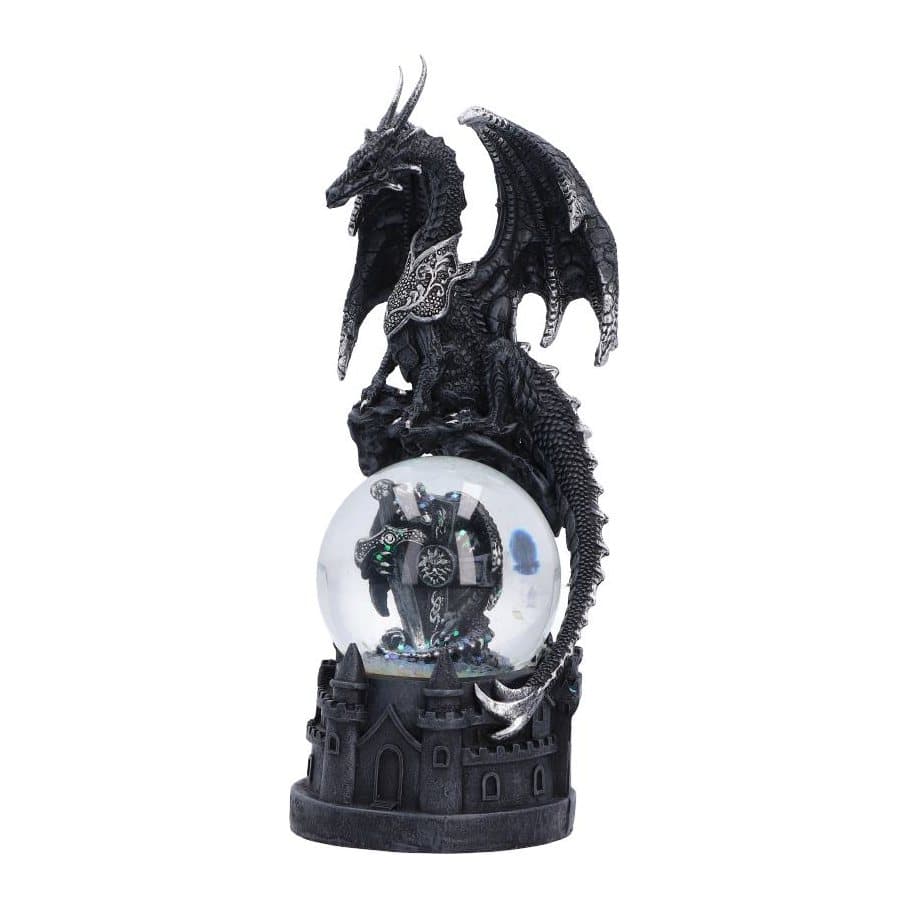 Black and silver dragon figurine guarding a snow globe on a rocky base