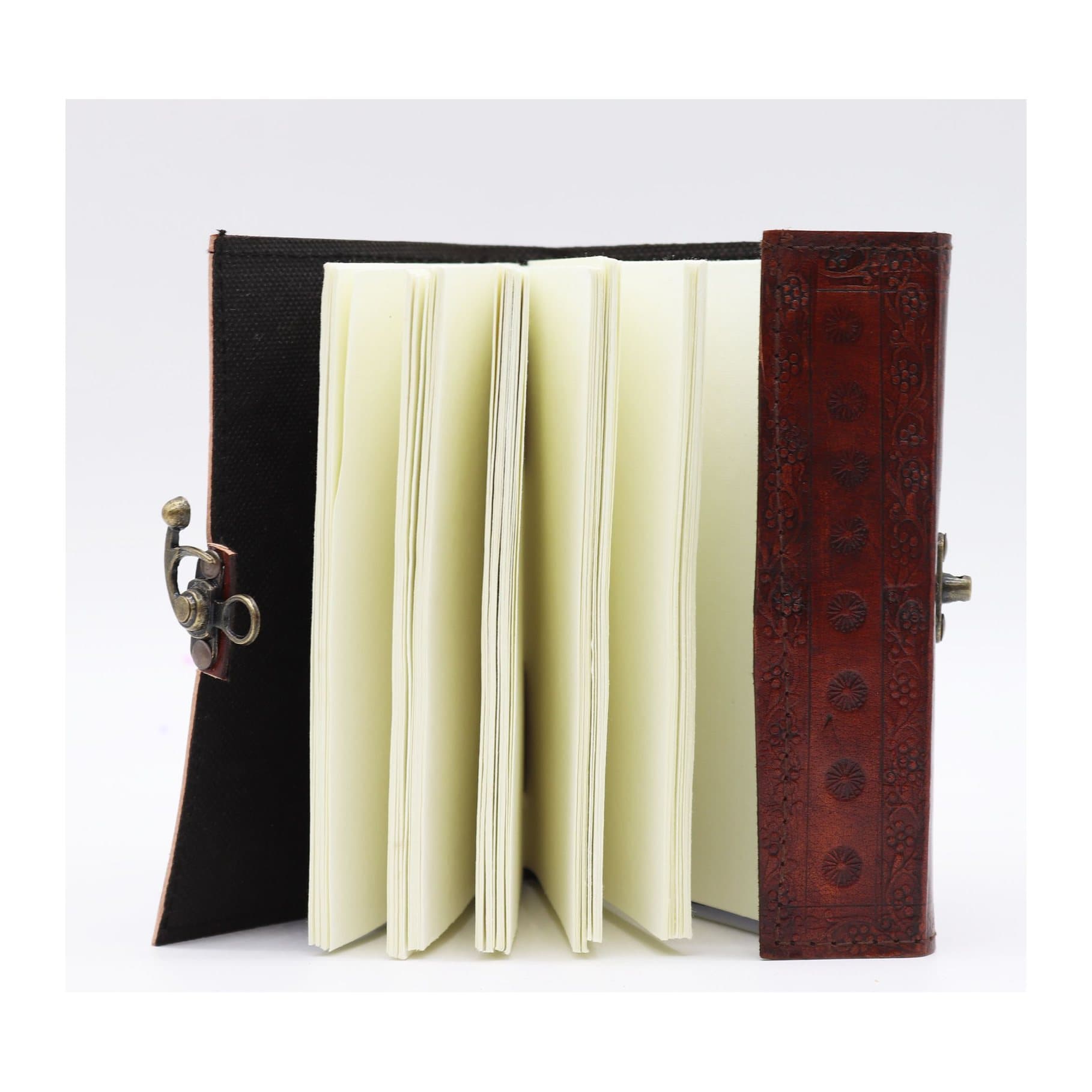 Leather notebooks and journals with dragon, mandala, Buddha, pentacle and tree designs
