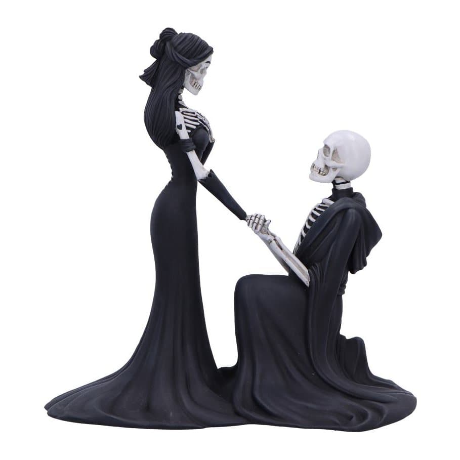 Gothic figurine of a skeleton couple in a proposal with matte black robes