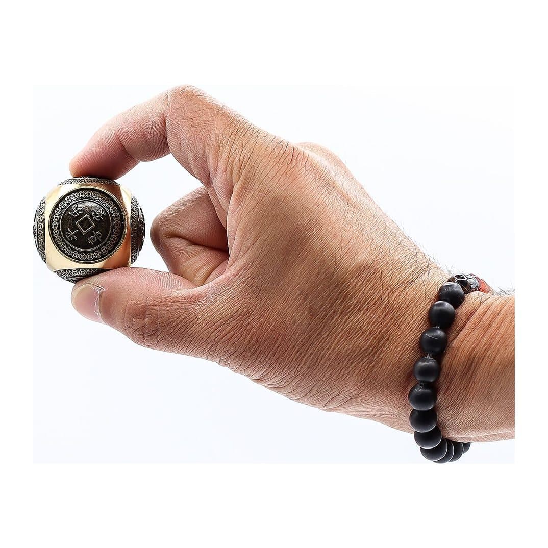 Rounded feng shui wealth dice with Chinese coin motifs